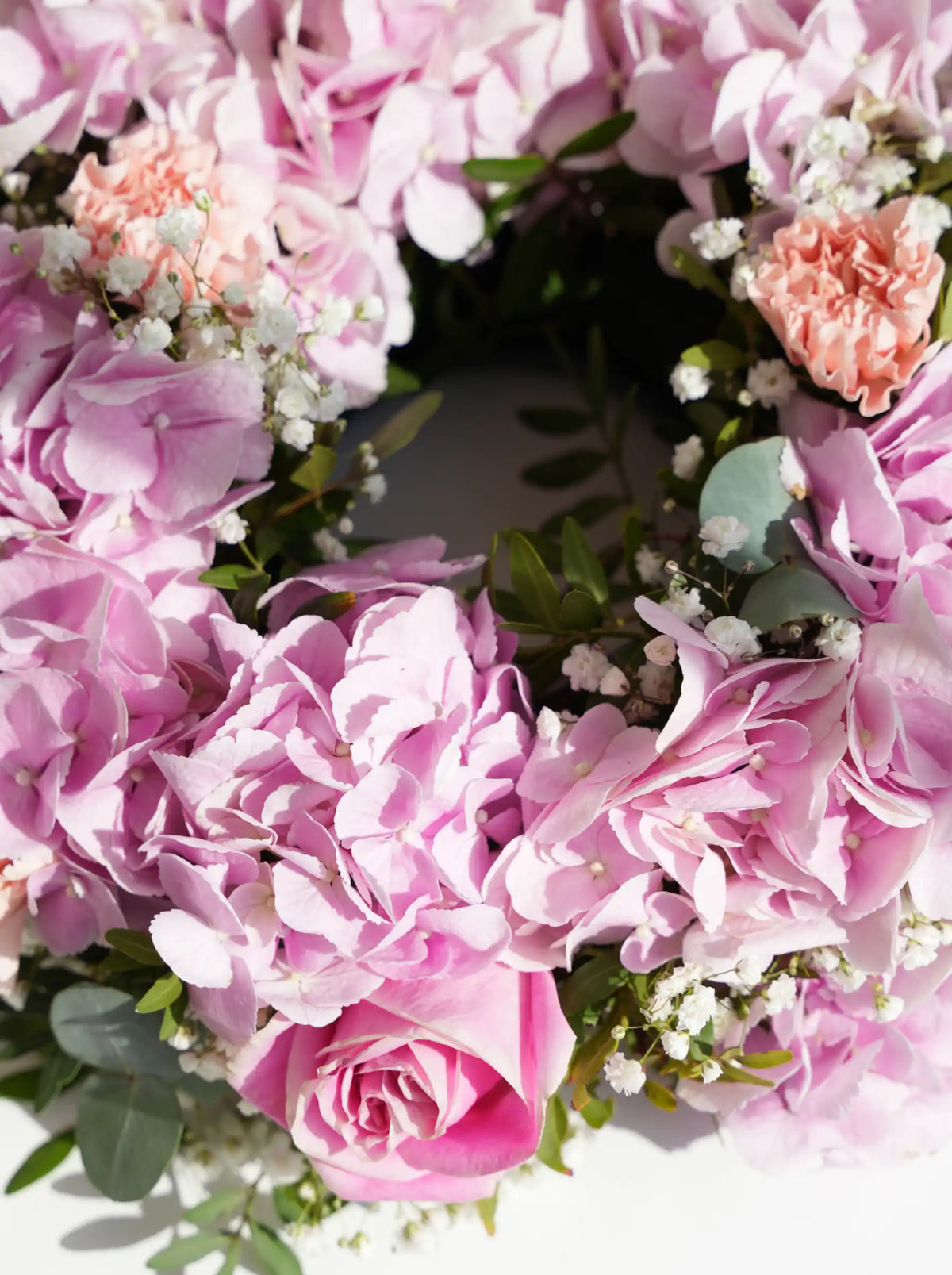 Pretty Pink Funeral Wreath
