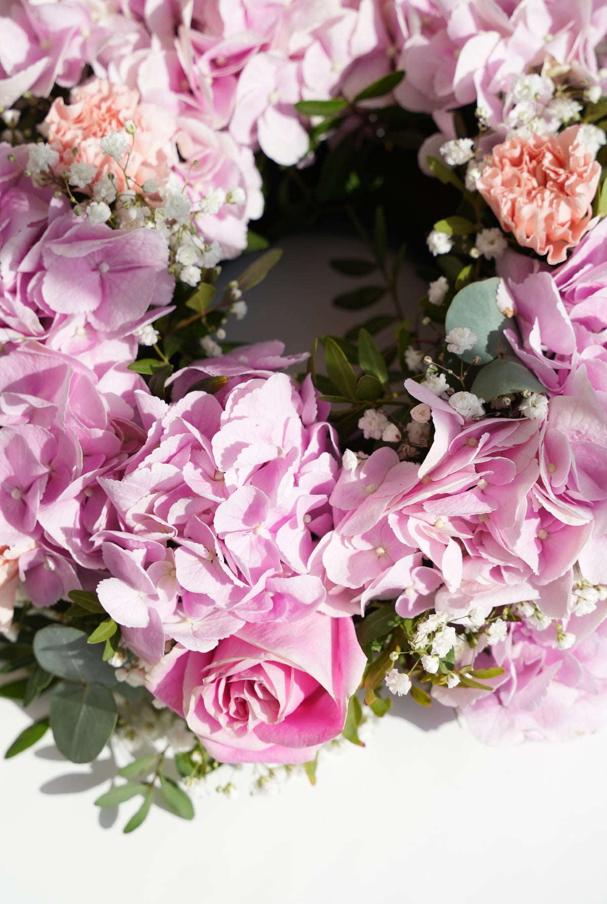 Pretty Pink Funeral Wreath