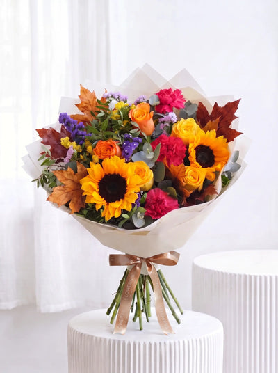 Autumn Vibrant hand-tied bouquet of sunflowers, orange roses and rich autumn foliage, Flowers.ie