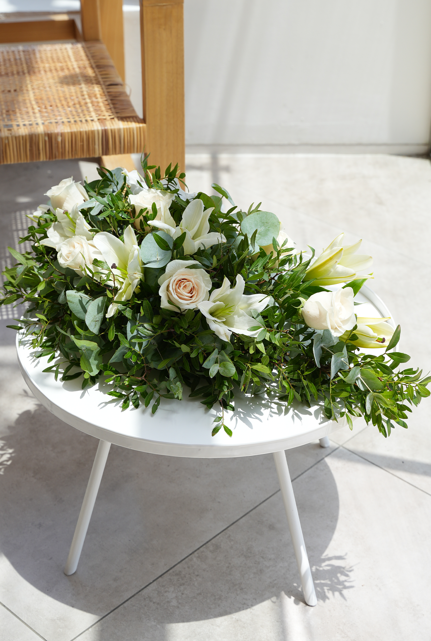 white lily funeral arrangement White Roses and White Lily Funeral Spray– Flowers.ie